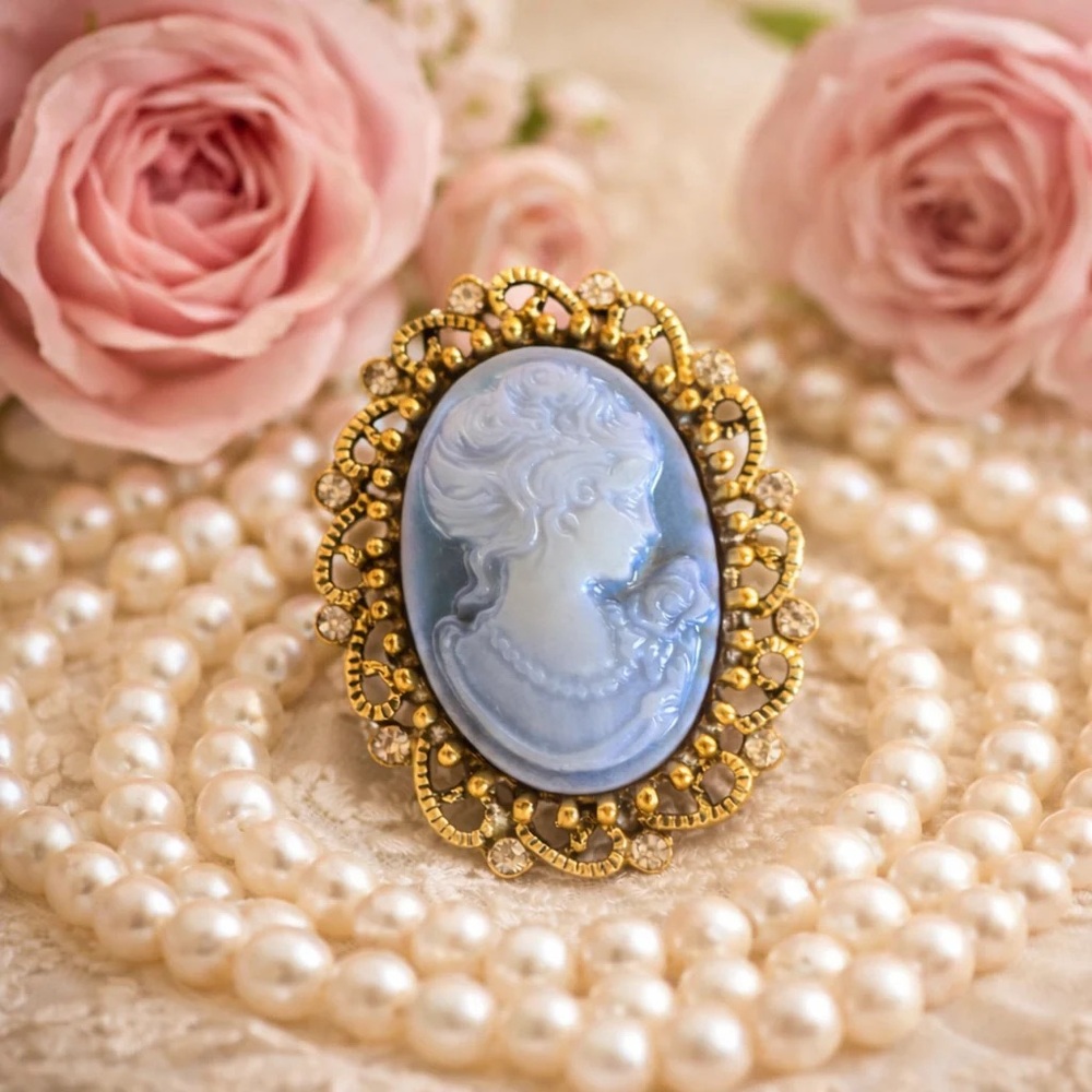 light blue Cameo crystal pin brooch.